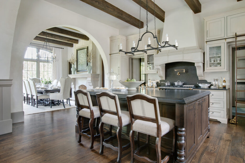 Rich Kitchen Design with Chocolate woods and bright cabinetry