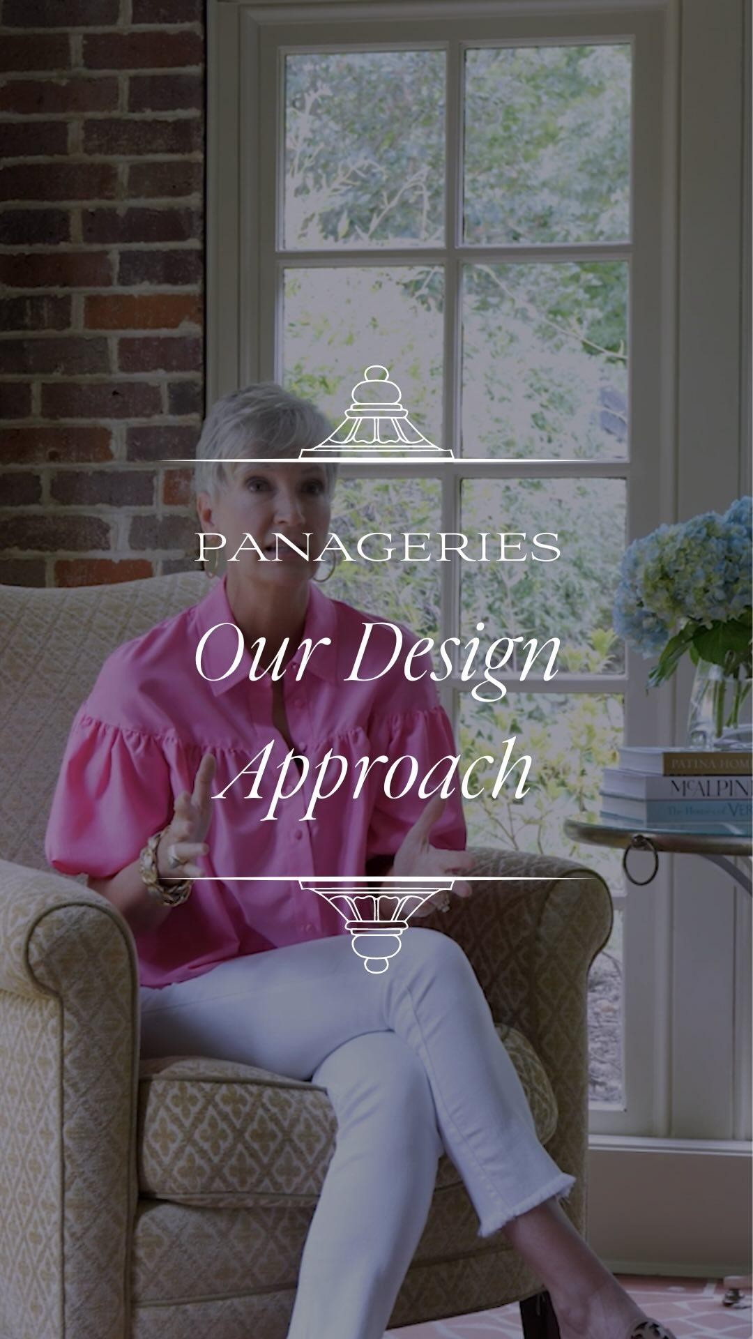 Cynthia sitting in a chair explaining how the Panageries design process