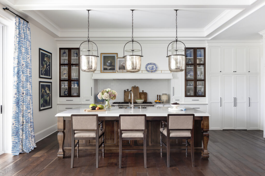 Traditional kitchen with island seating and custom drapery